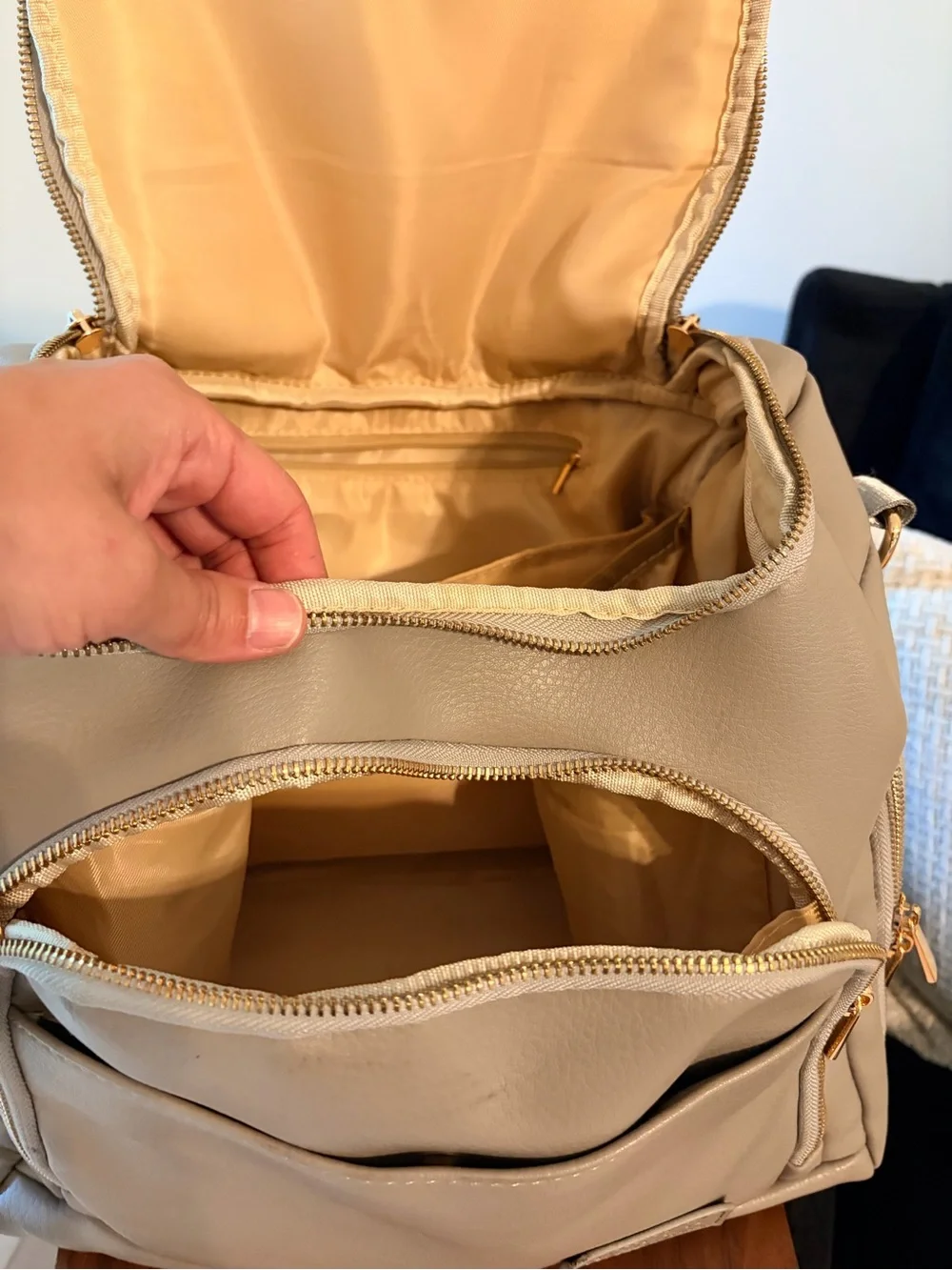 Stylish Cream Baby Bag Backpack with Gold Hardware